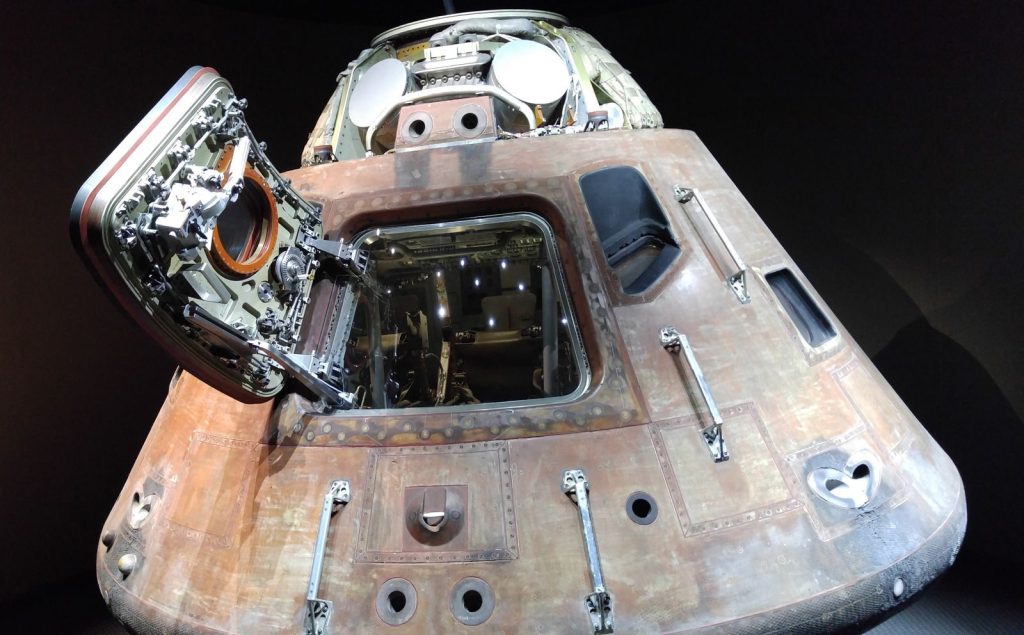 Close-up view of a NASA Apollo command module showcasing intricate details of space exploration technology.
