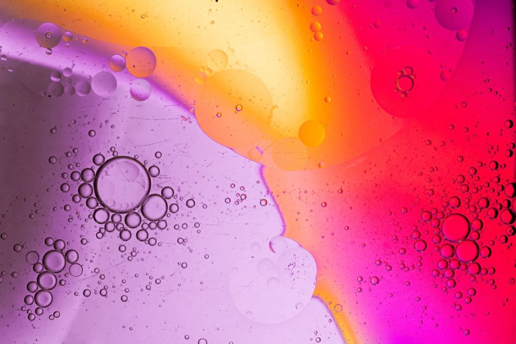 Vibrant abstract of bubbles in liquid with vivid colors and textures.