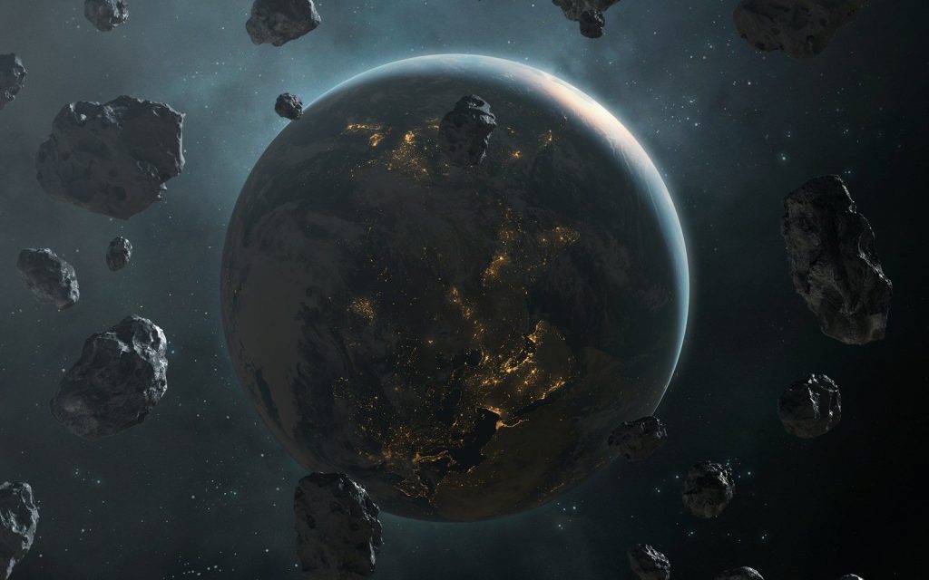 Planet earth surrounded by asteroids in space.