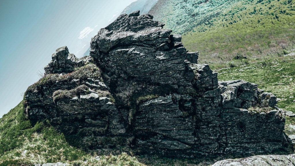 a rocky outcropping on the side of a mountain