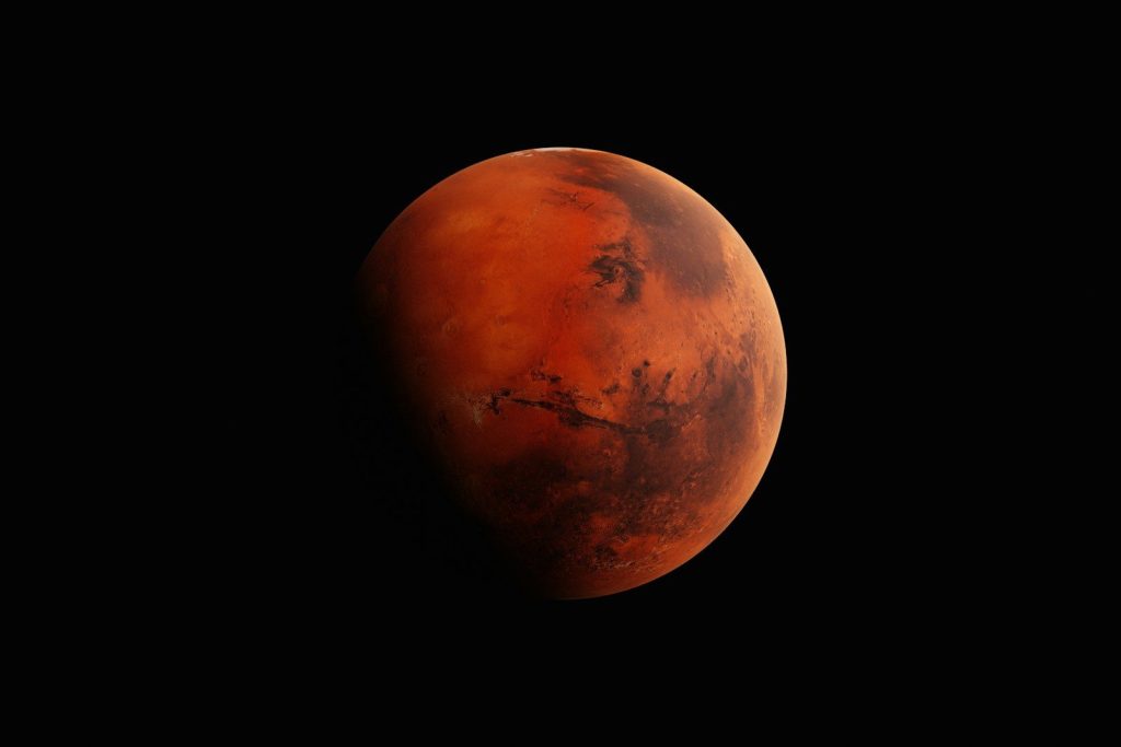 The planet mars against a black background