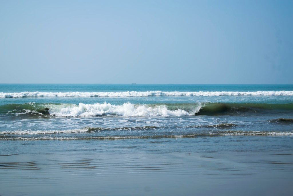 Ocean waves rolling onto a sandy beach