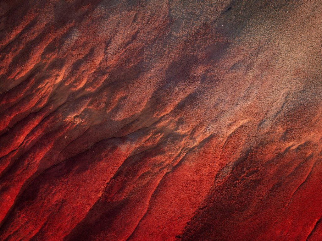 An aerial view of a red and black landscape