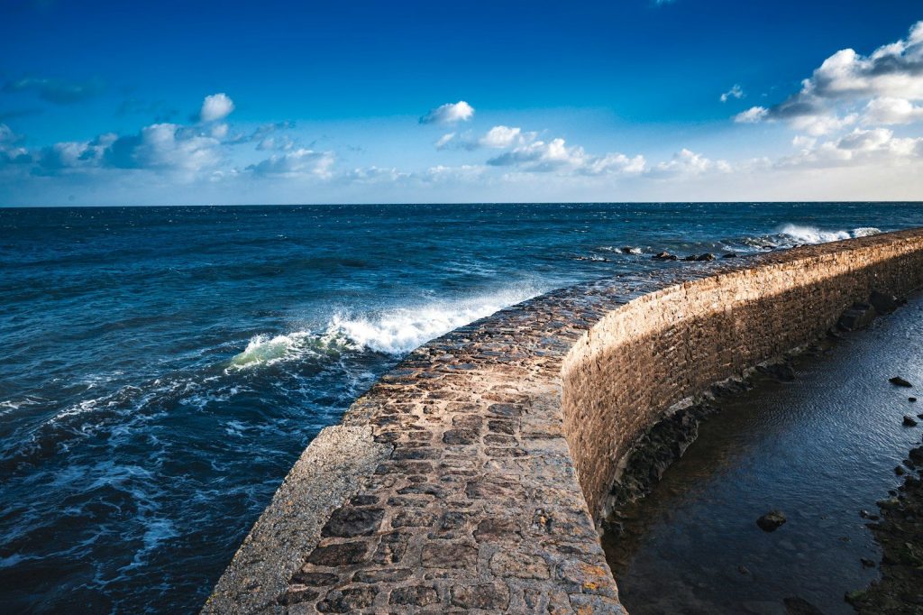 A view of the ocean from a pier