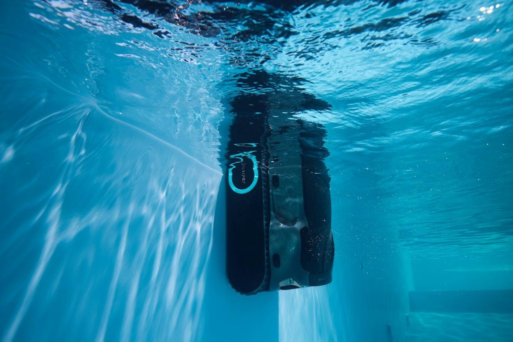 A dive fin floats beneath the water.