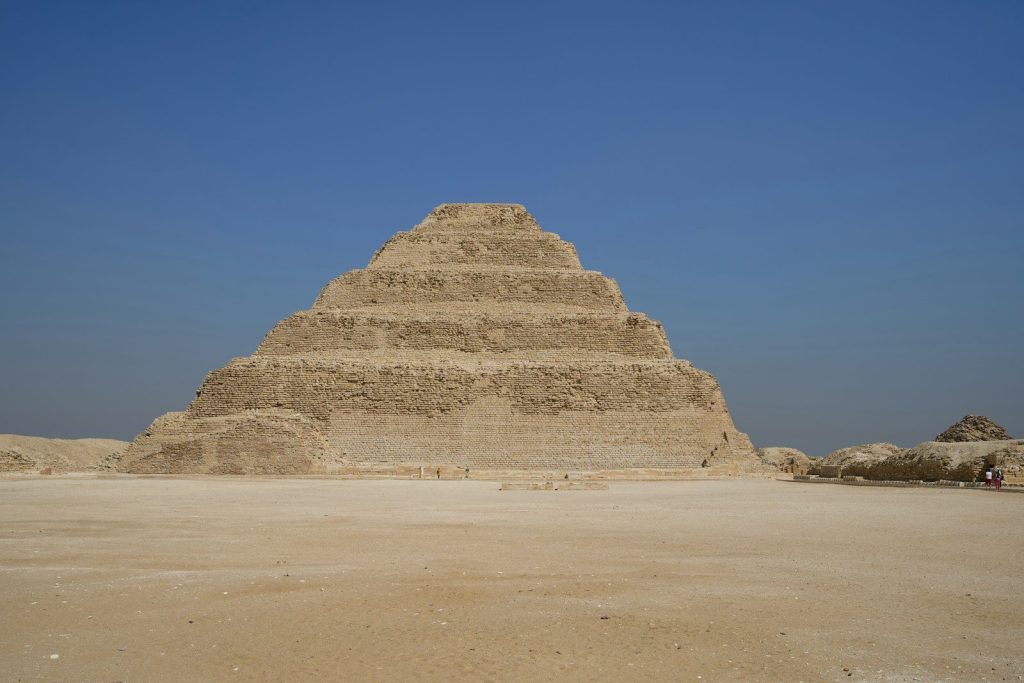 a large pyramid in the middle of a desert