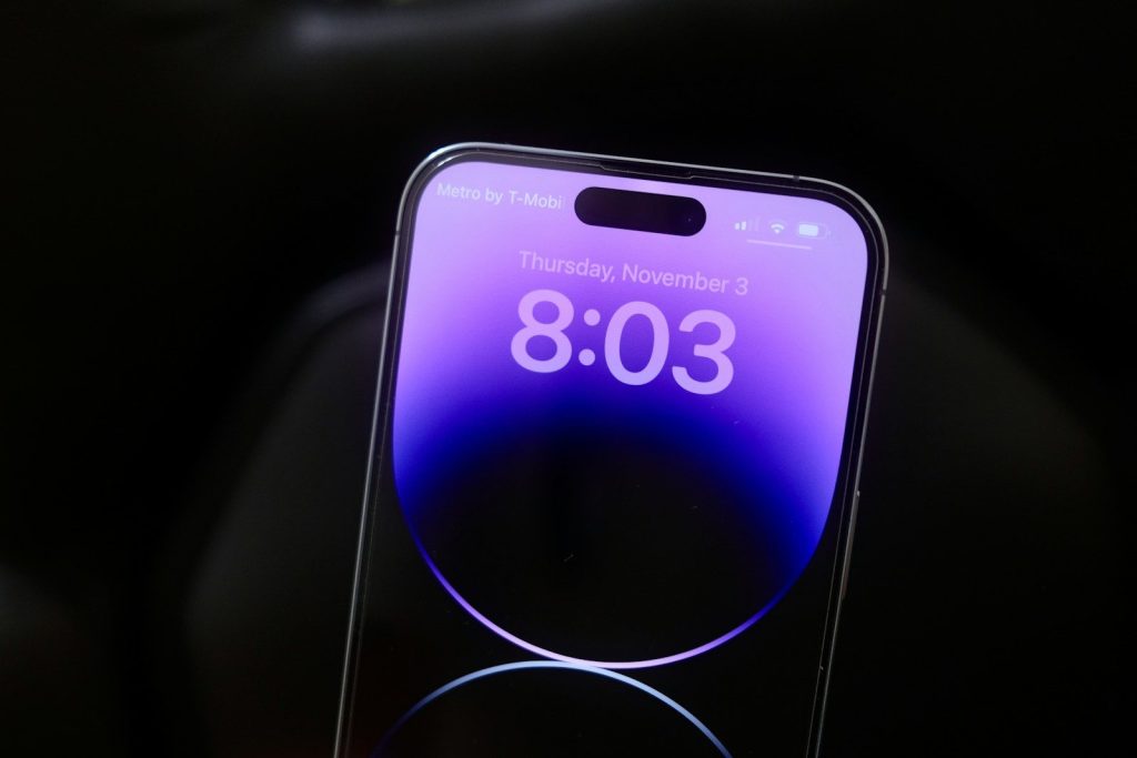 a cell phone with a purple screen